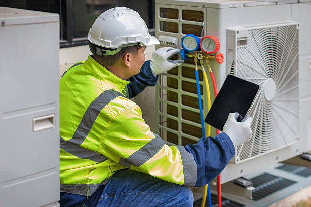 Professional Heat Pump Repair technician working in Juliette, GA